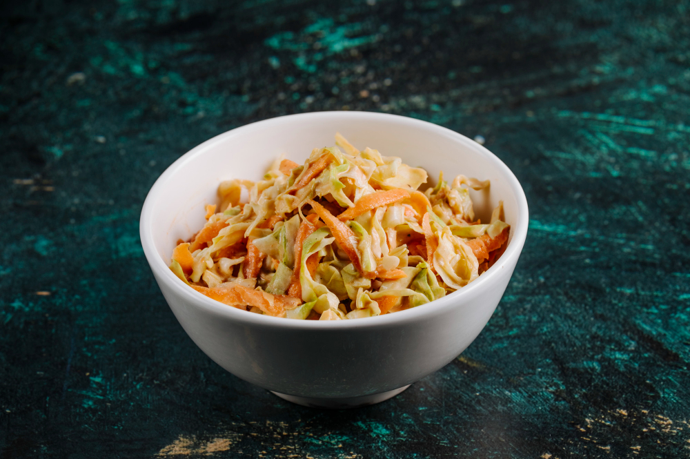 A-bowl-of-rice-mixed-with shredded chicken and broth served in a clean dog bowl